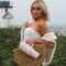 model holding light pink 40 oz large tumbler with handle