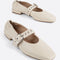 creme mary jane flats with elastic back and thick buckle strap with silver grommets and buckle