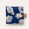 packaged cobalt blue shopper bag with abstract white flowers