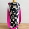 white wine tote with abstract white checkered print and fuchsia handle with a bottle inside