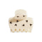 cream puffy hair claw with black rhinestone mickey design