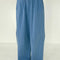 model wearing cornflower cotton wide leg pants with side inlets