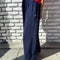 model wearing navy flowy pants