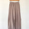 mushroom cotton wide leg pants with side inlets on a hanger