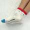 model wearing white crew socks with red trim and light blue embroidered heart