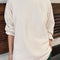 model wearing naturel relaxed fit raglan sweatshirt tunic