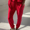model wearing red apple pointelle jogger pants