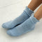 model wearing periwinkle ruffle socks