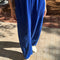 model wearing cobalt blue corduroy arc pants
