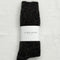 packaged black heather slouchy socks