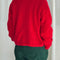 back view of model wearing red mohair cardigan