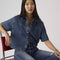 model wearing western dark denim short sleeve button down top