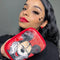 model holding red makeup eraser with mickey face