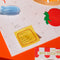 set of 4 mini sticky note tabs: sardines, olive, tomato and ravioli on a calendar