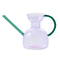 lavender abstract shaped watering can with teal colored spout and handle