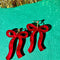 up close of red bow dangle earrings