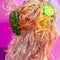model wearing large glitter pickle shaped hair claw