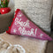 pink pennant throw pillow with white 'HECK YEAH!' cross the front