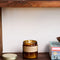 golden coast scented large concentrates soy candle on a shelf