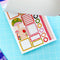 model showing interior sticker pages of pretty planner stickers book with mushroom stickers