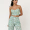 model wearing mint cropped tank with dainty blueberry vine print and wide leg pants