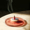 burning incense droplet