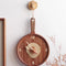 wooden frying pan with egg center wall clock