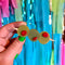 model holding olive trio hair clips