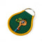 side view of green patch keychain with richard scarry lowly worm