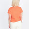 back view of model wearing orange cropped relaxed tee with realistic sunflower print