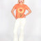 model wearing orange cropped relaxed tee with realistic sunflower print