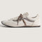 side view of vans super low pro with brown, beige and cream with brown wraparound laces
