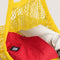 bright yellow mesh bag with items inside