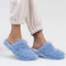 model wearing periwinkle fuzzy slide slippers