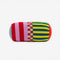 front view of multicolored bolster pillow with various stripes and checkered print