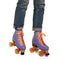 These periwinkle-colored roller-skates feature peach laces and sparkly peach wheels.