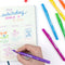 image of purple pen and the vibrant colors doodled in a notebook