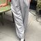 model wearing heather grey jogger sweatpants