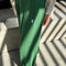 side view of model wearing moss green pointelle balloon pants