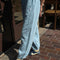 side view of model wearing light blue jogger sweatpants