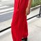 side view of model wearing red cotton balloon pants