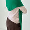 model wearing kelly green shawl