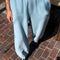model wearing light blue jogger sweatpants