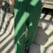model wearing moss green pointelle balloon pants