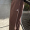 model wearing brown gardners pants with front patches