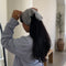 model wearing light grey bandana in their hair