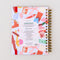 back view of periwinkle medium 17-month planner with scattered oil supplies print