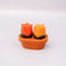 red and orange tulip salt and pepper shakers with brown pot tray