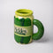 side view of green pickle jar ceramic mug with pickle crunchy dill label and pickle handle