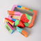 side view of set of 6 colorful erasers in a tin container with a window in the front